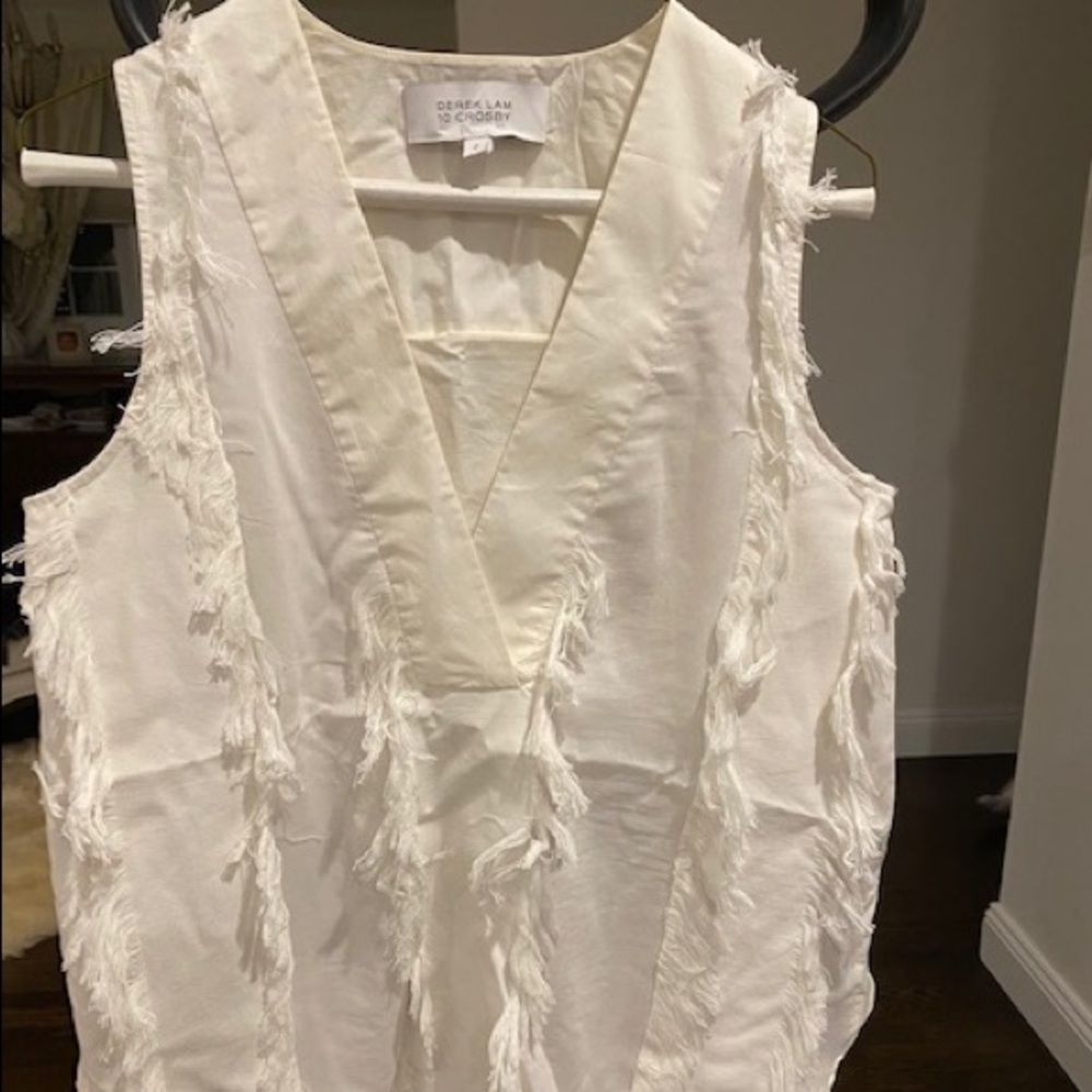 White intricate cut off shirt